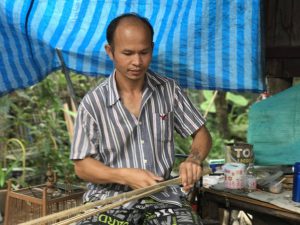 Thai artisan making a rice box