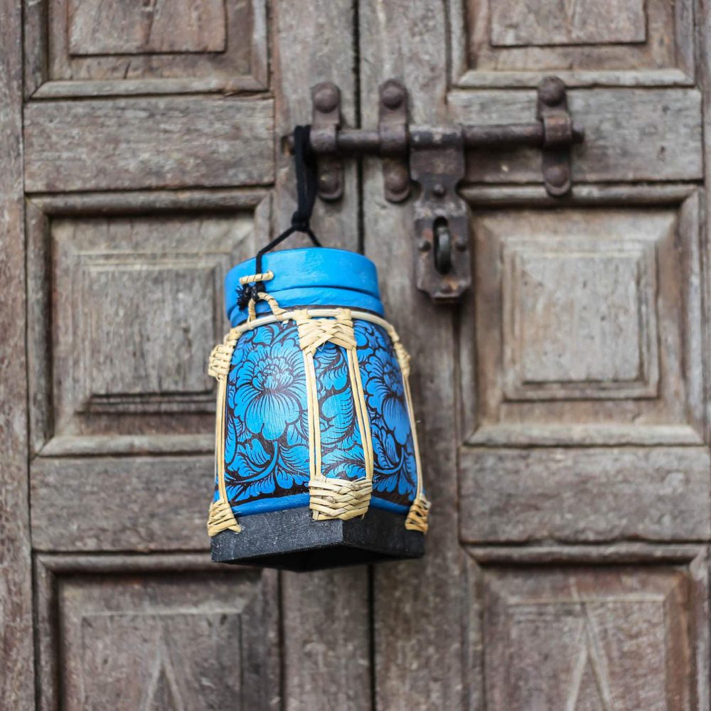 Small beautiful hand-made rice box with blue floral design